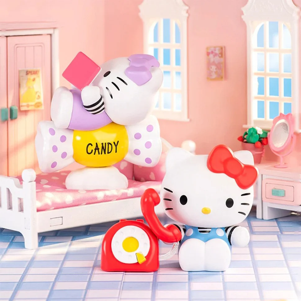 Механічна іграшка-сюрприз Hello Kitty 10 см пластикова пастельна