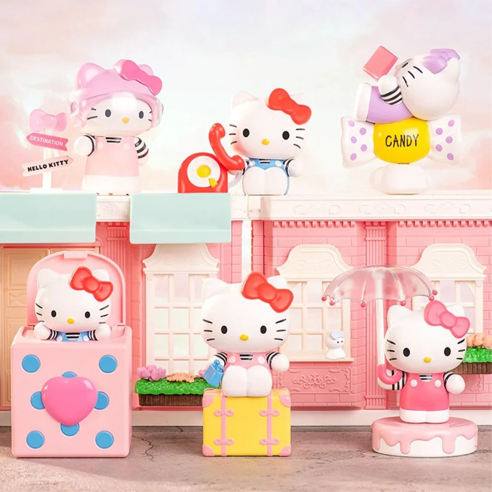 Механічна іграшка-сюрприз Hello Kitty 10 см пластикова пастельна
