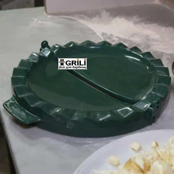 Прес для кальцоне Big Green Egg L 28 см пластик зелений