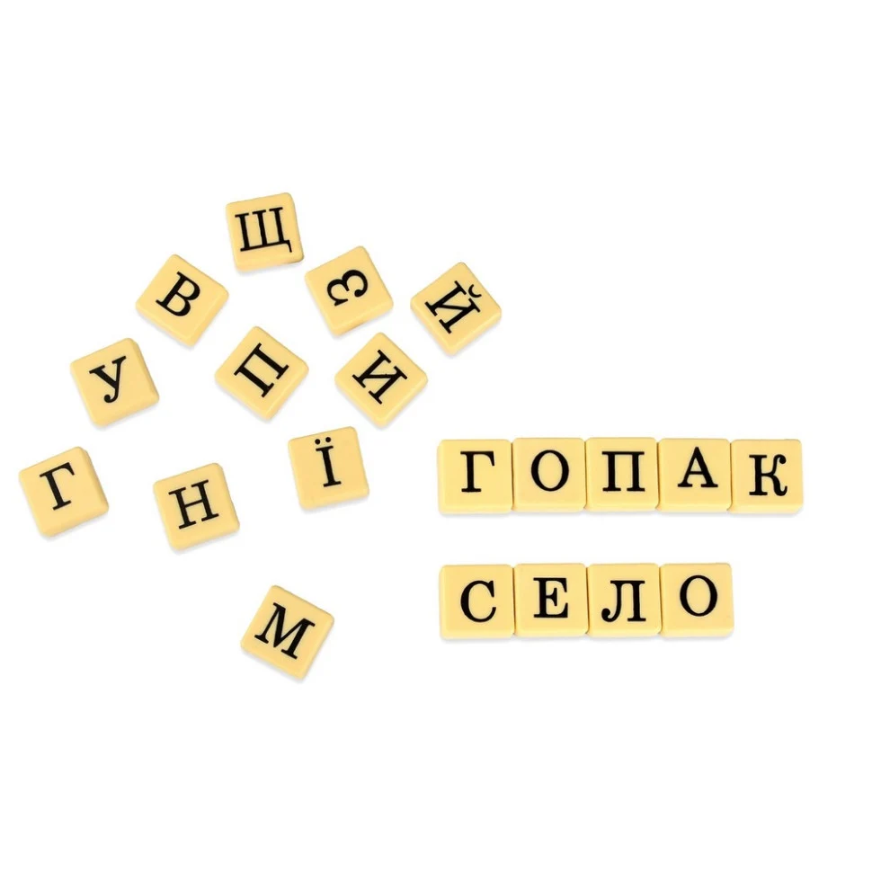 Настольная игра Словогонка 100 плиток с буквами картон для 3-6 гравців від 10 років